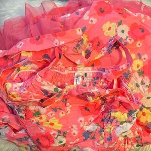 Youth dress with flowers, hot pink with tulle at the bottom.